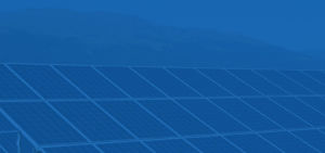 background image of solar panels and mountains
