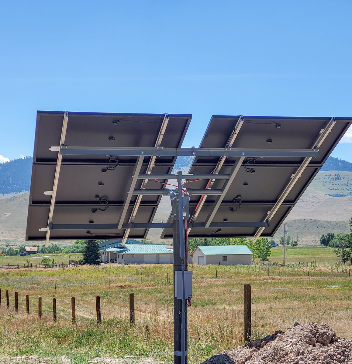 six panel solar array in rural pasture
