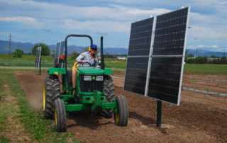 tractor working at agrivoltaics site Colorado