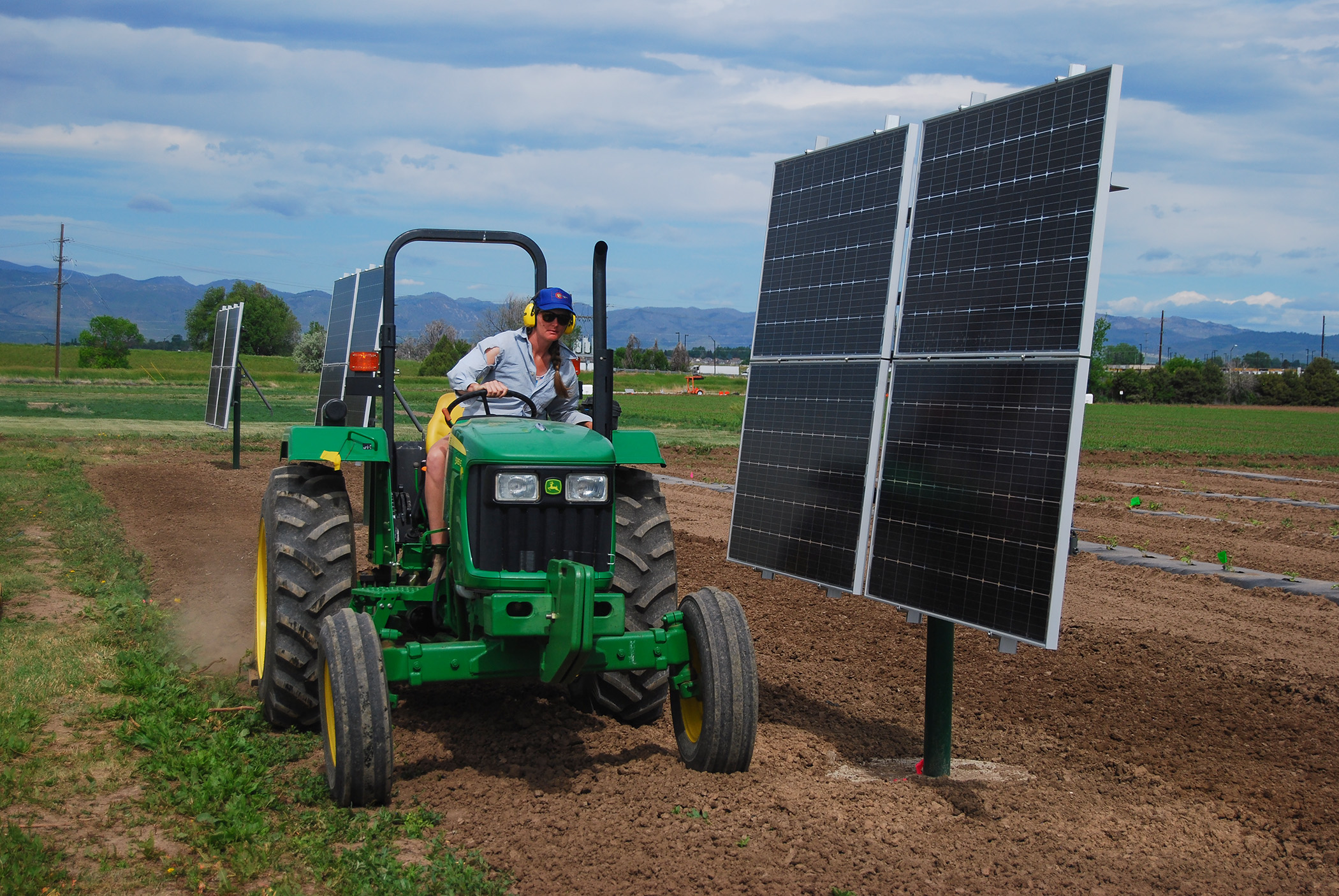 tractor working at agrivoltaics site Colorado